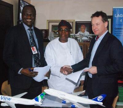 Pix from left Eng Lookman Animashaun, Head of Engineering, Medview Airline; Alhaji Muneer Bankole, MD and Mr Magnus Asgeirsson, Director of Sales, Air Atlanta during the signing of aircraft B747 400 agreement between Medview Airline and Air Atlanta in Lagos on Monday. Photo Lamidi Bamidele