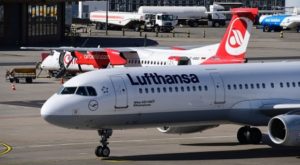 Aircrafts of German airlines Air Berlin (background) and Lufthansa stand on the tarmac at the Tegel airport in Berlin on September 29, 2016. Struggling Air Berlin, Germany's second-largest airline, announced on September 28, 2016 a major restructuring plan that shrinks its fleet and cuts 1,200 jobs. Air Berlin said it would provide up to 40 Airbus 320 aircraft to rival Lufthansa, the leading German carrier. It would operate up to 38 of the planes under a six-year agreement beginning in 2017. / AFP / TOBIAS SCHWARZ (Photo credit should read TOBIAS SCHWARZ/AFP/Getty Images)