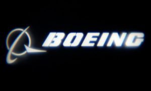 The Boeing Company logo is projected on a wall at the "What's Next?" conference in Chicago, Illinois, U.S., October 4, 2016.    REUTERS/Jim Young