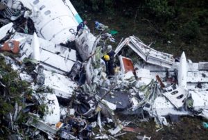 Rescue crew work at the wreckage from a plane that crashed into Colombian jungle with Brazilian soccer team Chapecoense near Medellin, Colombia, November 29, 2016. REUTERS/Fredy Builes